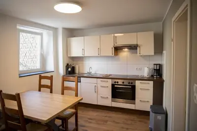 Küche/Küchenzeile in der Unterkunft Ferienhaus zum Brauneberg