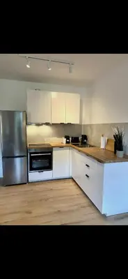Küche/Küchenzeile in der Unterkunft Modernes Apartment mit gehobener Ausstattung