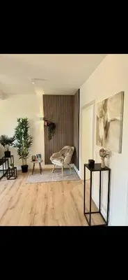 Ein Sitzbereich in der Unterkunft Modernes Apartment mit gehobener Ausstattung