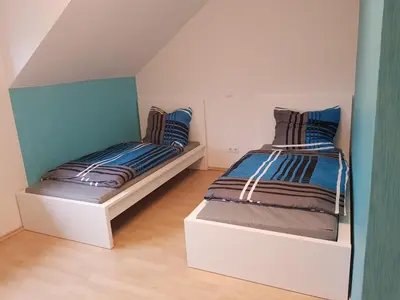 Ein Bett oder Betten in einem Zimmer der Unterkunft Ferienwohnung Stefanie OG
