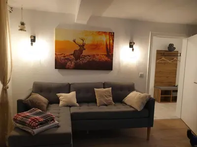Ein Sitzbereich in der Unterkunft Ferienwohnung zur Honigschleife