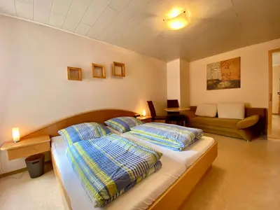Ein Bett oder Betten in einem Zimmer der Unterkunft Gästehaus im Oberdorf