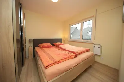 Ein Bett oder Betten in einem Zimmer der Unterkunft Ferienwohnung Fine