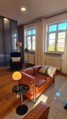 Ein Sitzbereich in der Unterkunft Loft am Airport Hahn