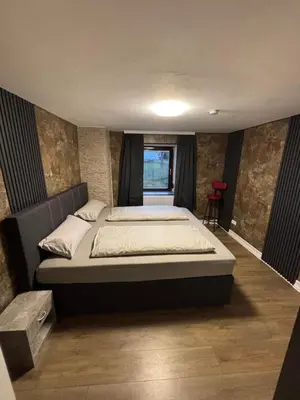 Ein Bett oder Betten in einem Zimmer der Unterkunft Haus am Freilinger See Bar
