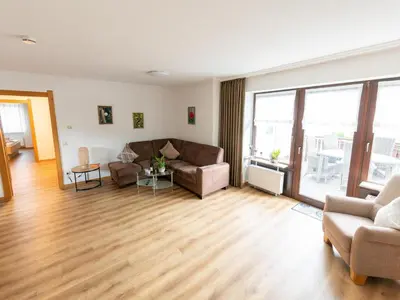 Ein Sitzbereich in der Unterkunft Ferienwohnung Weingut Thielen-Nilles