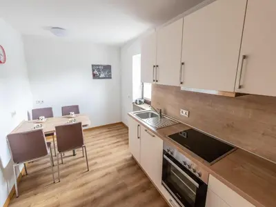 Küche/Küchenzeile in der Unterkunft Ferienwohnung Weingut Thielen-Nilles