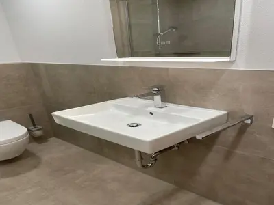 Ein Badezimmer in der Unterkunft Ferienwohnung Weingut Thielen-Nilles