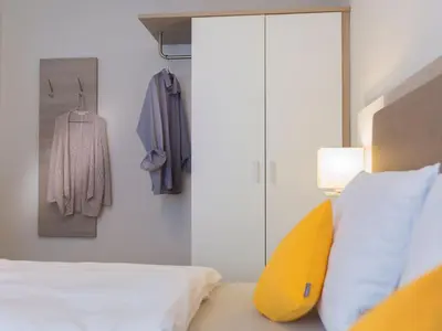 Ein Bett oder Betten in einem Zimmer der Unterkunft Apartment Cozy-Flat 2 by Interhome