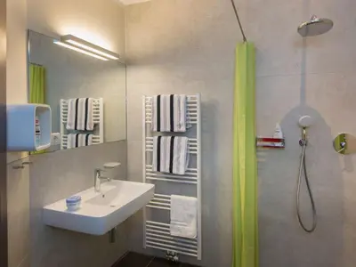 Ein Badezimmer in der Unterkunft Apartment Cozy-Flat 2 by Interhome