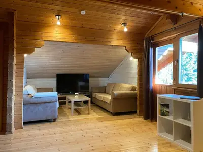 Ein Bett oder Betten in einem Zimmer der Unterkunft Holiday Home Chalet mit Garten- Grill und Terrasse by Interhome
