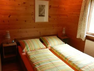 Ein Bett oder Betten in einem Zimmer der Unterkunft Holiday Home Eifelcottage Wildvogel by Interhome