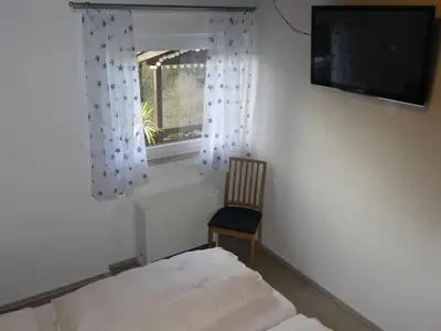 Ein Bett oder Betten in einem Zimmer der Unterkunft Holiday Home Stausee by Interhome