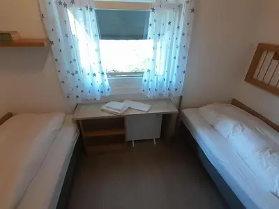 Ein Bett oder Betten in einem Zimmer der Unterkunft Holiday Home Stausee by Interhome