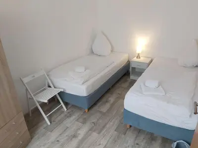 Ein Bett oder Betten in einem Zimmer der Unterkunft Holiday Home L by Interhome