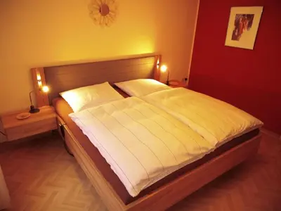 Ein Bett oder Betten in einem Zimmer der Unterkunft Apartment FeWo Sonnenblume by Interhome