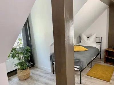 Ein Bett oder Betten in einem Zimmer der Unterkunft Holiday Home Terrassenhaus by Interhome