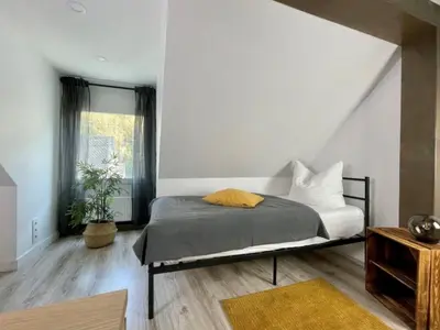 Ein Bett oder Betten in einem Zimmer der Unterkunft Holiday Home Terrassenhaus by Interhome