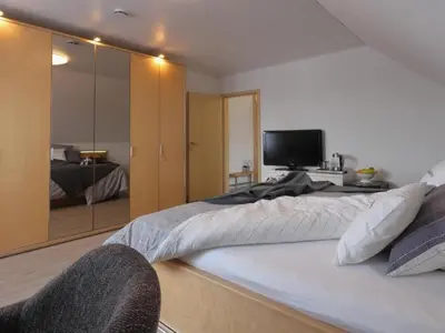 Ein Bett oder Betten in einem Zimmer der Unterkunft Apartment Appartement in Mastershausen mit Terrasse- Garten und Grill by Interhome