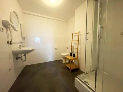 Ein Badezimmer in der Unterkunft Ferienzimmer mit Küche mitten im Zentrum perfekt um die Stadt zu erkunden