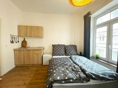 Ein Bett oder Betten in einem Zimmer der Unterkunft Wunderschöne Unterkunft mitten im Herzen von Koblenz