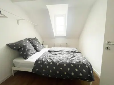 Ein Bett oder Betten in einem Zimmer der Unterkunft Wunder schöne Ferienunterkunft mitten im Zentrum von Koblenz