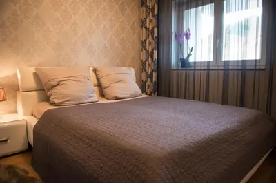 Ein Bett oder Betten in einem Zimmer der Unterkunft Rosaliya