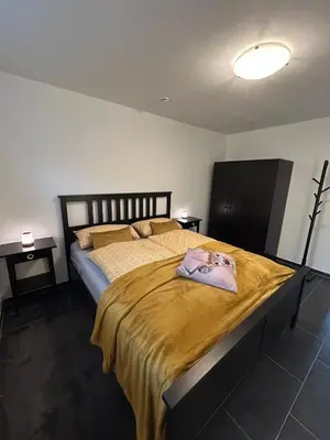 Ein Bett oder Betten in einem Zimmer der Unterkunft Ferienwohnung im Hasenwieschen