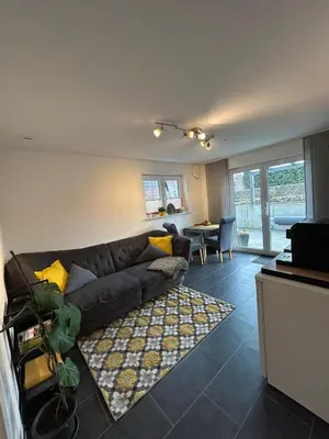 Ein Sitzbereich in der Unterkunft Ferienwohnung im Hasenwieschen