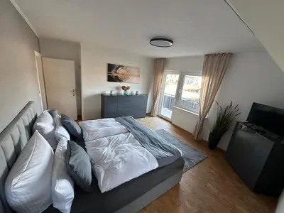 Ein Bett oder Betten in einem Zimmer der Unterkunft FeWo Seul