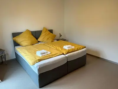 Ein Bett oder Betten in einem Zimmer der Unterkunft Ferienwohnung in Bendorf am Rhein