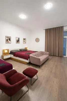 Ein Sitzbereich in der Unterkunft City Rooms Koblenz Hbf
