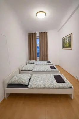 Ein Bett oder Betten in einem Zimmer der Unterkunft City Rooms Koblenz Hbf