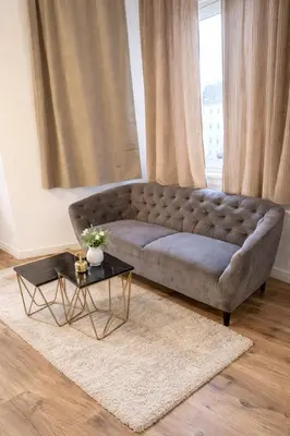 Ein Sitzbereich in der Unterkunft City Rooms Koblenz Hbf