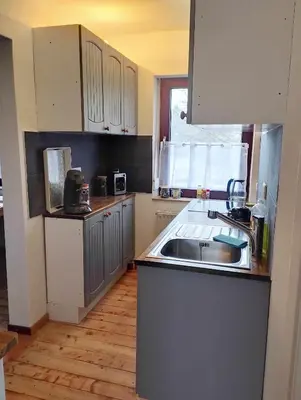 Küche/Küchenzeile in der Unterkunft Ferien Monteur Wohnung Nikki