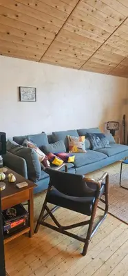 Ein Sitzbereich in der Unterkunft Romantic barn with sauna