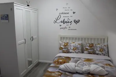 Ein Bett oder Betten in einem Zimmer der Unterkunft Gemütliche Wohnung in Mendig