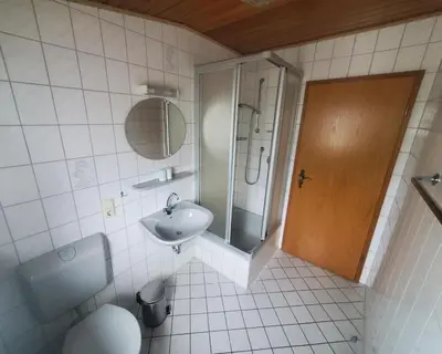Ein Badezimmer in der Unterkunft FeWo Gästehaus Ebert Neukirch