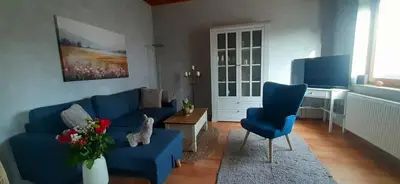 Ein Sitzbereich in der Unterkunft Haus am Bach