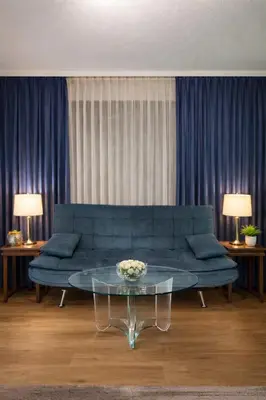 Ein Sitzbereich in der Unterkunft Eckblick Residence l Panorama Balkon