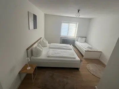 Ein Bett oder Betten in einem Zimmer der Unterkunft Lina Ferienhaus
