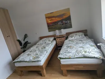 Ein Bett oder Betten in einem Zimmer der Unterkunft Kornkammer - Ferienhaus NaheZeit Bostalsee