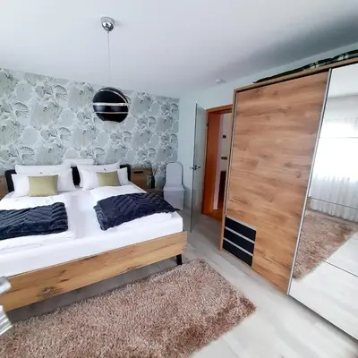 Ein Bett oder Betten in einem Zimmer der Unterkunft Ferienwohnung 