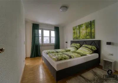 Ein Bett oder Betten in einem Zimmer der Unterkunft Gästehaus Lydia - Klüsserather Bruderschaft