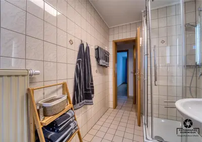 Ein Badezimmer in der Unterkunft Gästehaus Lydia - Klüsserather Bruderschaft