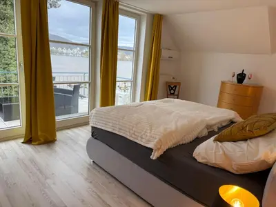Ein Bett oder Betten in einem Zimmer der Unterkunft Viktoria`s Penthouse