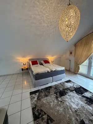 Ein Bett oder Betten in einem Zimmer der Unterkunft Viktoria`s Penthouse