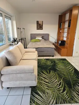 Ein Sitzbereich in der Unterkunft Apartment Kliniknähe