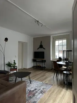 Ein Sitzbereich in der Unterkunft Urban Premium - City-Suite am Park für 2 Pers