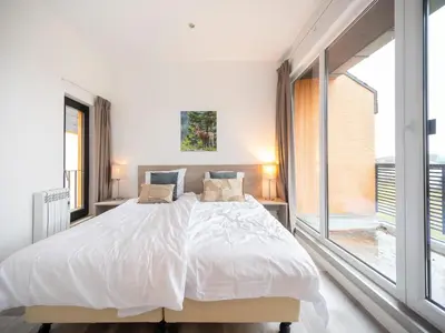 Ein Bett oder Betten in einem Zimmer der Unterkunft Hambachtal forest hideaway boutique resort